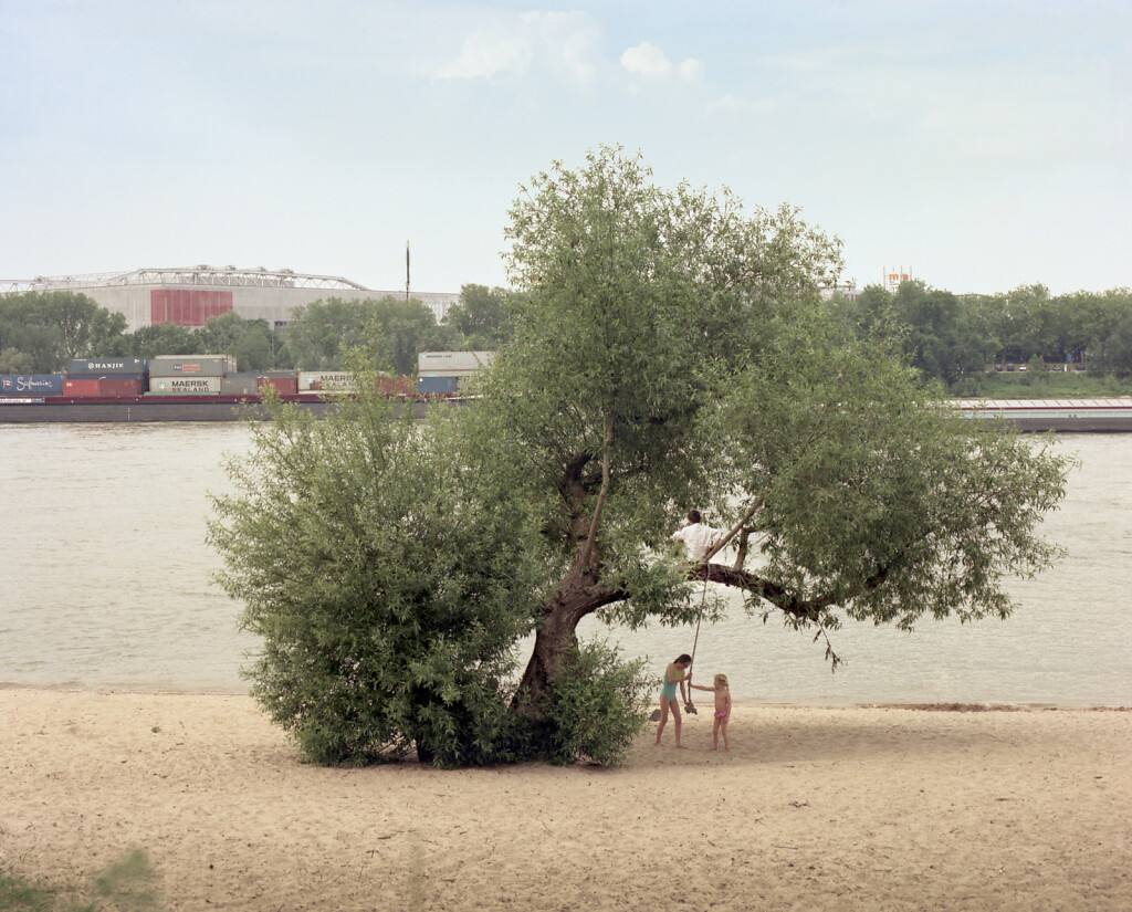 Child on swing at the Rhine meanders, Meerbusch